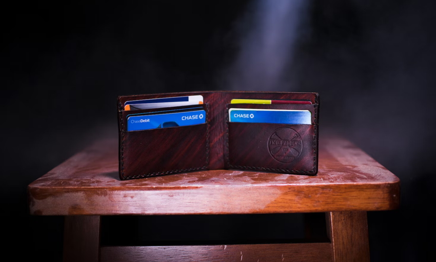 A wallet with credit cards - Unsplash